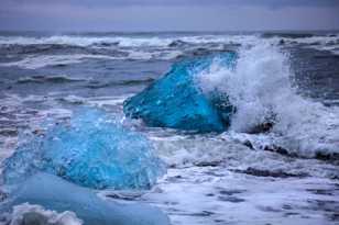 Icebergs in surf-9299